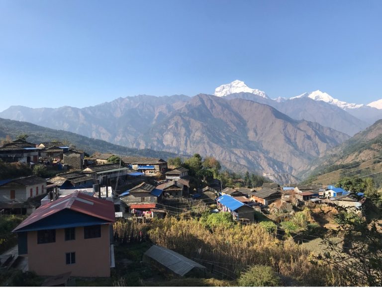 Traditional Mountain Village with Dhaulagiri and Himalayan Views