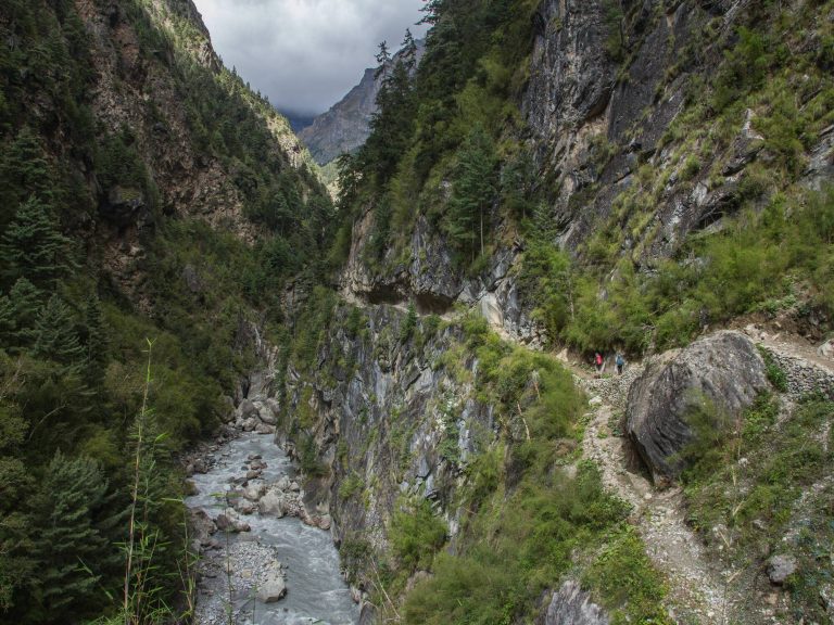 Trekking through a dramatic mountain gorge